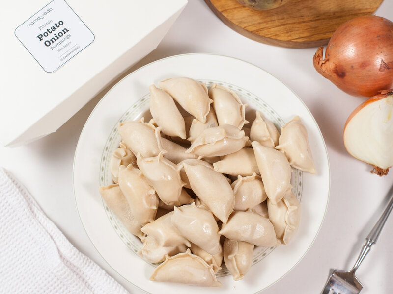 Sweet vareniki dumplings with cottage cheese and vanilla