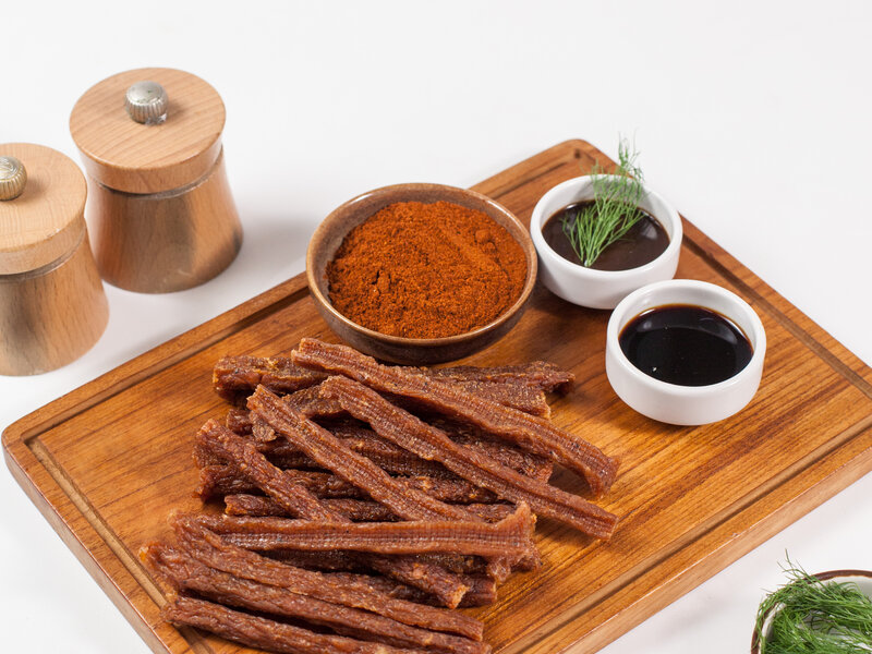 Dried chicken sausage jerky strips