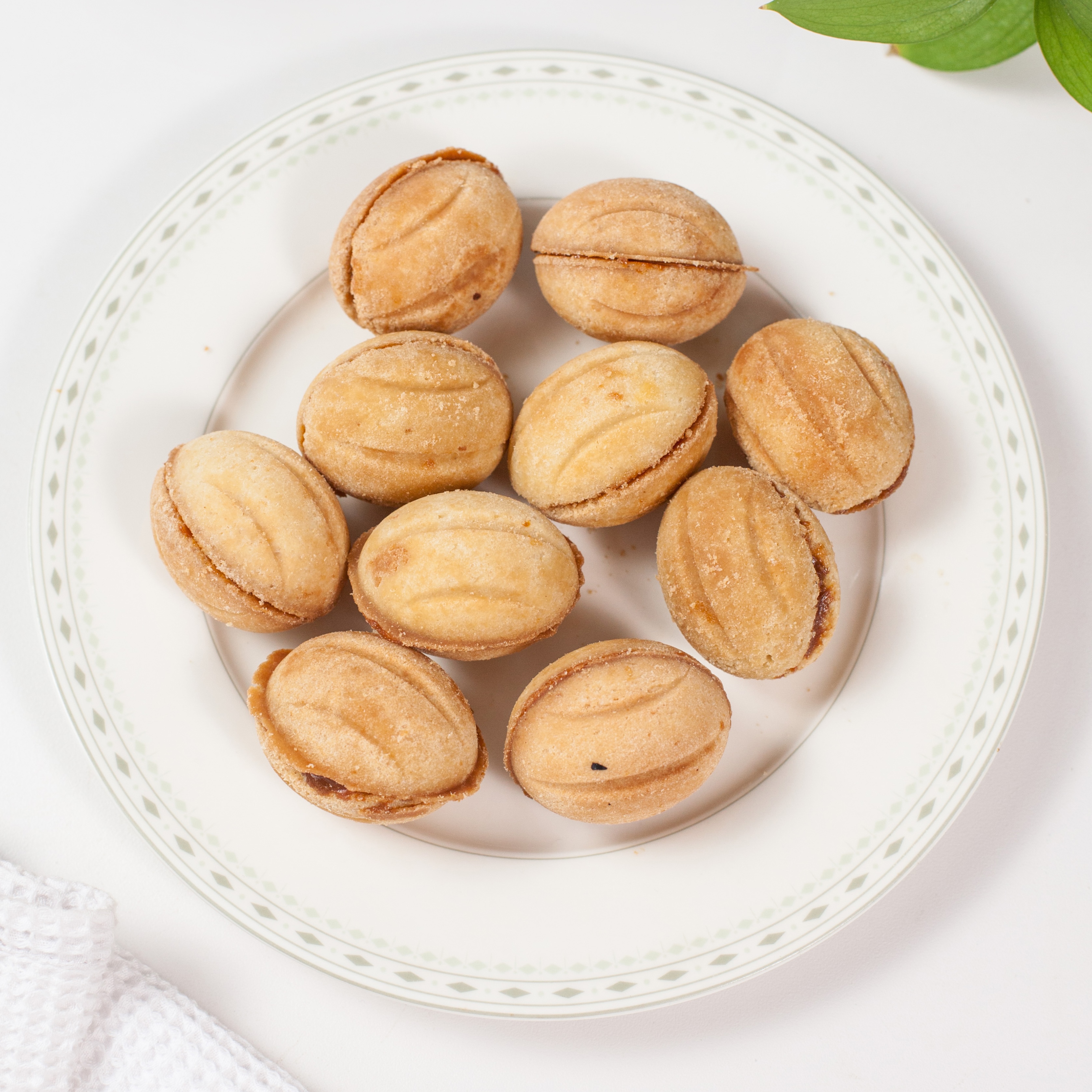 Oreshki — walnut-shaped shortbread cookies filled with boiled condensed milk