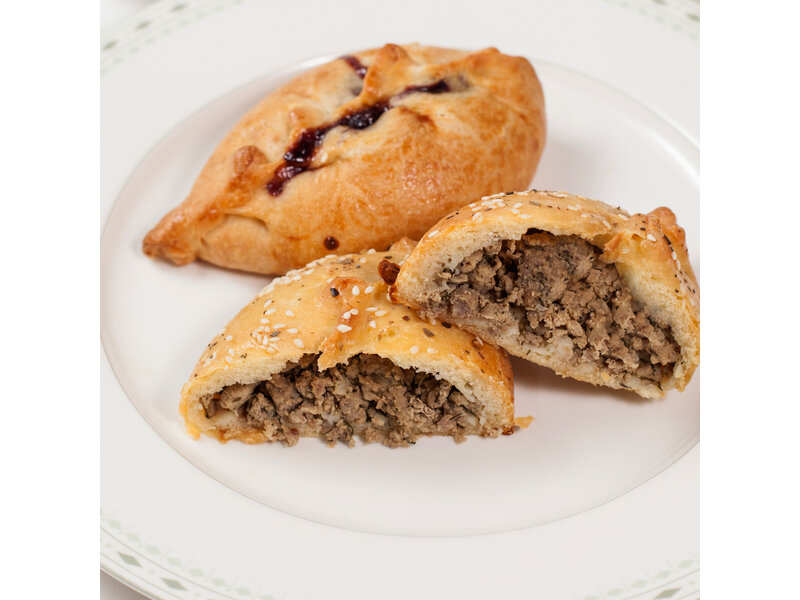 Beef pirozhki — traditional Russian baked hand pie